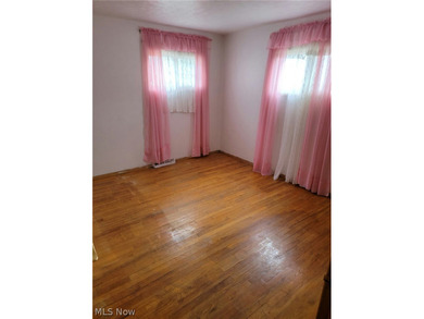 Charming Euclid Brick Duplex. The property at 535-537 E 208th St - photo 17