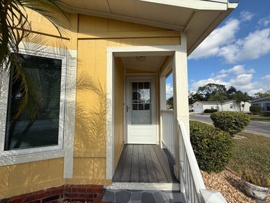 This well cared for 2-bedroom, 2-bathroom Palm Harbor home is - photo 4