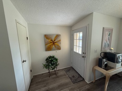 This well cared for 2-bedroom, 2-bathroom Palm Harbor home is - photo 5