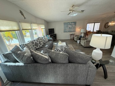 This well cared for 2-bedroom, 2-bathroom Palm Harbor home is - photo 6