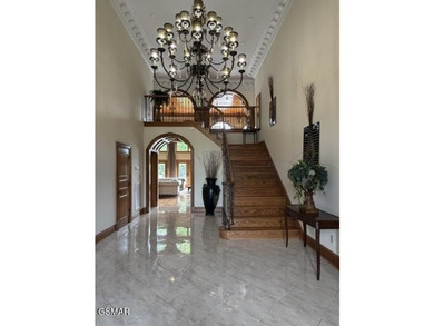 THIS MAGNIFICENT SMOKY MOUNTAIN ESTATE BOASTS 11,312 SQ FT OF - photo 5