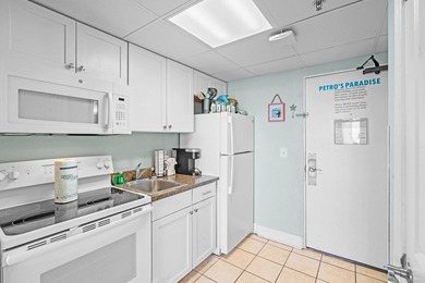 Welcome to 6900 Ocean Blvd. N, Unit 409. Enjoy effortless - photo 6