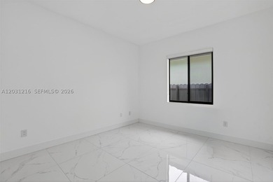 Built in 2023, this modern single-family residence offers the - photo 17