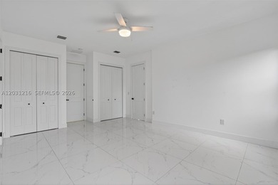 Built in 2023, this modern single-family residence offers the - photo 22