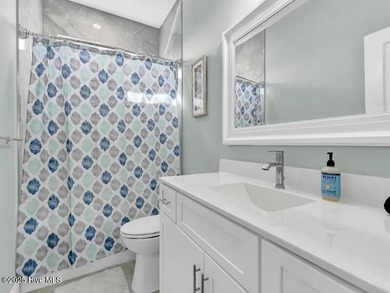 What a view from this Surf City Home with Solid Rental History