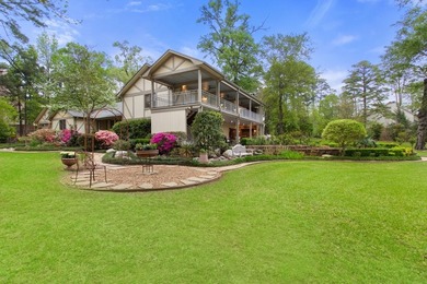 Nestled on two rare waterfront lots in a serene cul-de-sac, this - photo 1