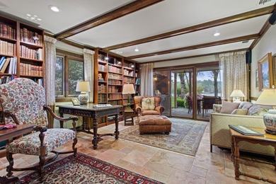 Nestled on two rare waterfront lots in a serene cul-de-sac, this - photo 3