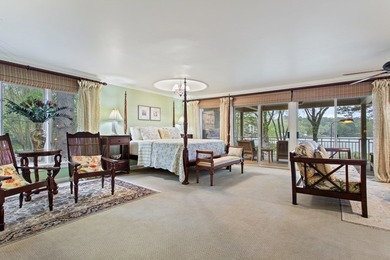 Nestled on two rare waterfront lots in a serene cul-de-sac, this - photo 7
