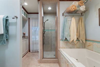 Nestled on two rare waterfront lots in a serene cul-de-sac, this - photo 9