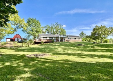 Check out this gorgeous 5 acre property with a country setting - photo 1