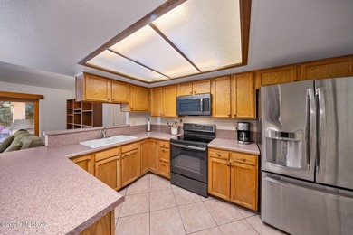 This well-kept home offers an open floor plan with vaulted