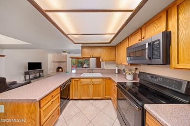 This well-kept home offers an open floor plan with vaulted