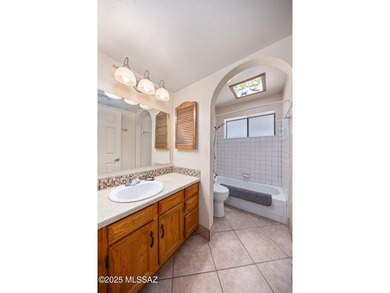 This well-kept home offers an open floor plan with vaulted