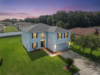 Virtually Staged. Experience elevated living in the gated - photo 1