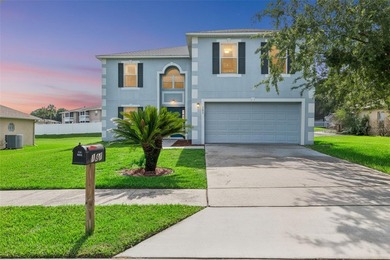 Virtually Staged. Experience elevated living in the gated - photo 2