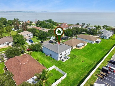 Virtually Staged. Experience elevated living in the gated - photo 3