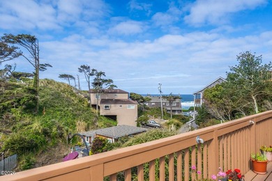 Mid-town beauty with large decks and ocean and surf views from - photo 11