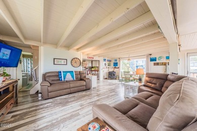 Mid-town beauty with large decks and ocean and surf views from - photo 16