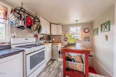 Mid-town beauty with large decks and ocean and surf views from - photo 20
