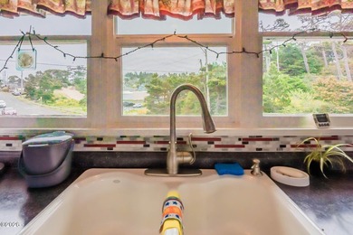 Mid-town beauty with large decks and ocean and surf views from - photo 24