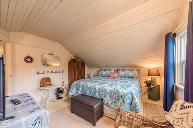 Mid-town beauty with large decks and ocean and surf views from - photo 28