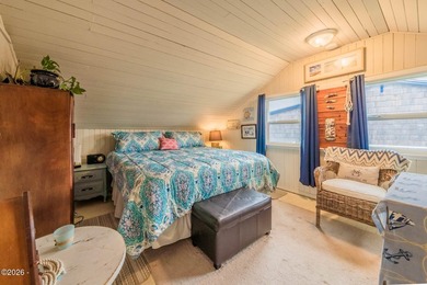 Mid-town beauty with large decks and ocean and surf views from - photo 29