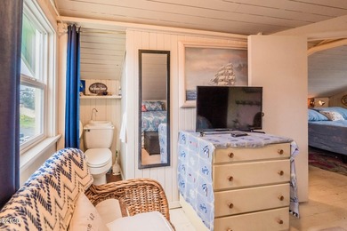 Mid-town beauty with large decks and ocean and surf views from - photo 30