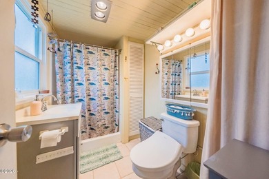 Mid-town beauty with large decks and ocean and surf views from - photo 34