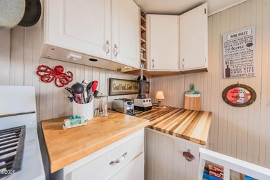 Mid-town beauty with large decks and ocean and surf views from - photo 36