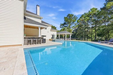 Nestled on one of the largest homesites in the prestigious - photo 5