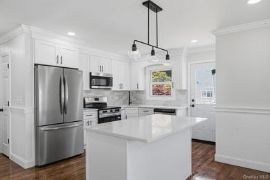 Welcome to 64 Cedar Drive, Bay Shore, NY 11706. This beautifully - photo 2