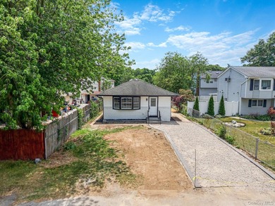 Welcome to 64 Cedar Drive, Bay Shore, NY 11706. This beautifully - photo 7