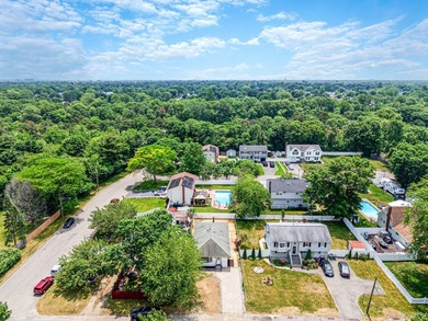 Welcome to 64 Cedar Drive, Bay Shore, NY 11706. This beautifully - photo 8