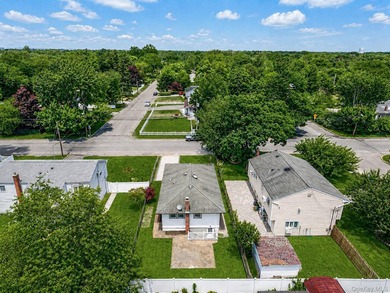 Welcome to 64 Cedar Drive, Bay Shore, NY 11706. This beautifully - photo 9