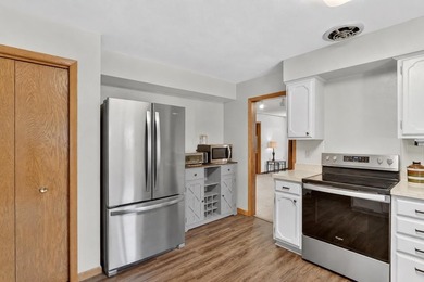 All-brick home offering space and comfort throughout! Features a - photo 14