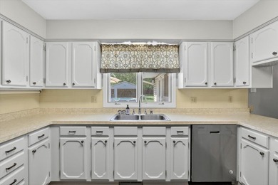 All-brick home offering space and comfort throughout! Features a - photo 15