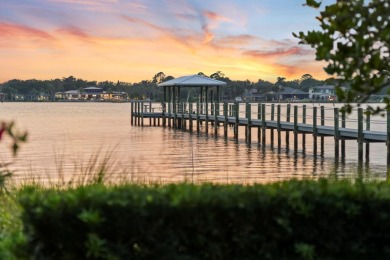 Experience luxurious riverfront living in this striking - photo 2