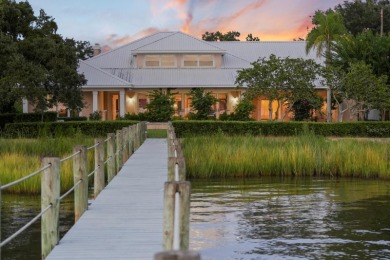 Experience luxurious riverfront living in this striking - photo 9