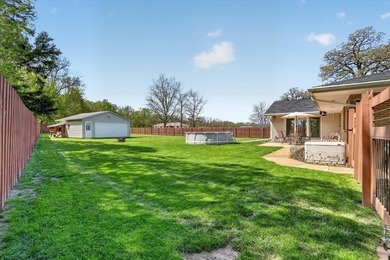 All-brick home offering space and comfort throughout! Features a - photo 50