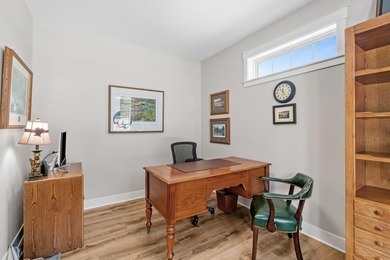 Luxury, low-maintenance living meets peaceful wooded privacy in - photo 9