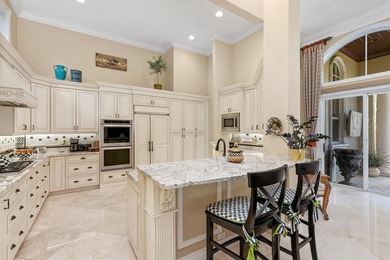Tucked within the prestigious enclave of Boca Bay Colony, this - photo 14