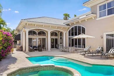 Tucked within the prestigious enclave of Boca Bay Colony, this - photo 16