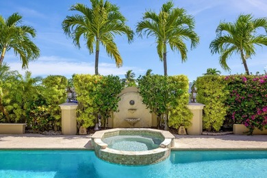 Tucked within the prestigious enclave of Boca Bay Colony, this - photo 18