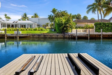 Tucked within the prestigious enclave of Boca Bay Colony, this - photo 20