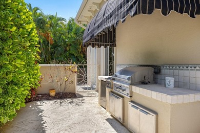 Tucked within the prestigious enclave of Boca Bay Colony, this - photo 23