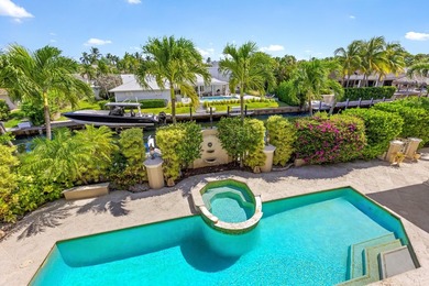 Tucked within the prestigious enclave of Boca Bay Colony, this - photo 24