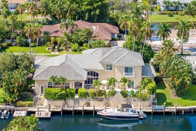Tucked within the prestigious enclave of Boca Bay Colony, this - photo 32