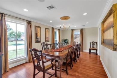 Welcome to this stunning two-story brick home in the highly