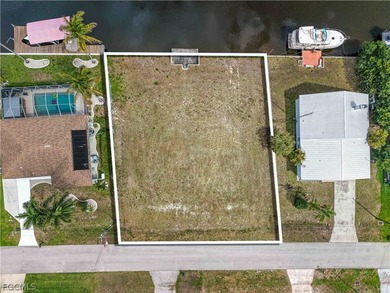 SAILBOAT ACCESS TRIPLE LOT ON INTERSECTING CANAL IN SE CAPE - photo 10