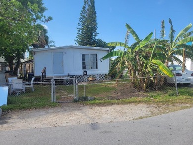 This 4 Bedroom 2-bathroom doublewide sits on a corner fenced lot - photo 1